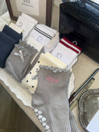 Grey Ruffle Grip Socks